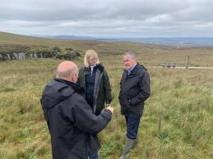 Finance Minister Conor Murphy with Jennifer Fulton, CEO of Ulster Wildlife, and Jim McAdam, Ulster Wildlife.